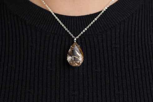 Dije Vitalluz: Cuarzo Rutilado y Plata .925 en forma de gota